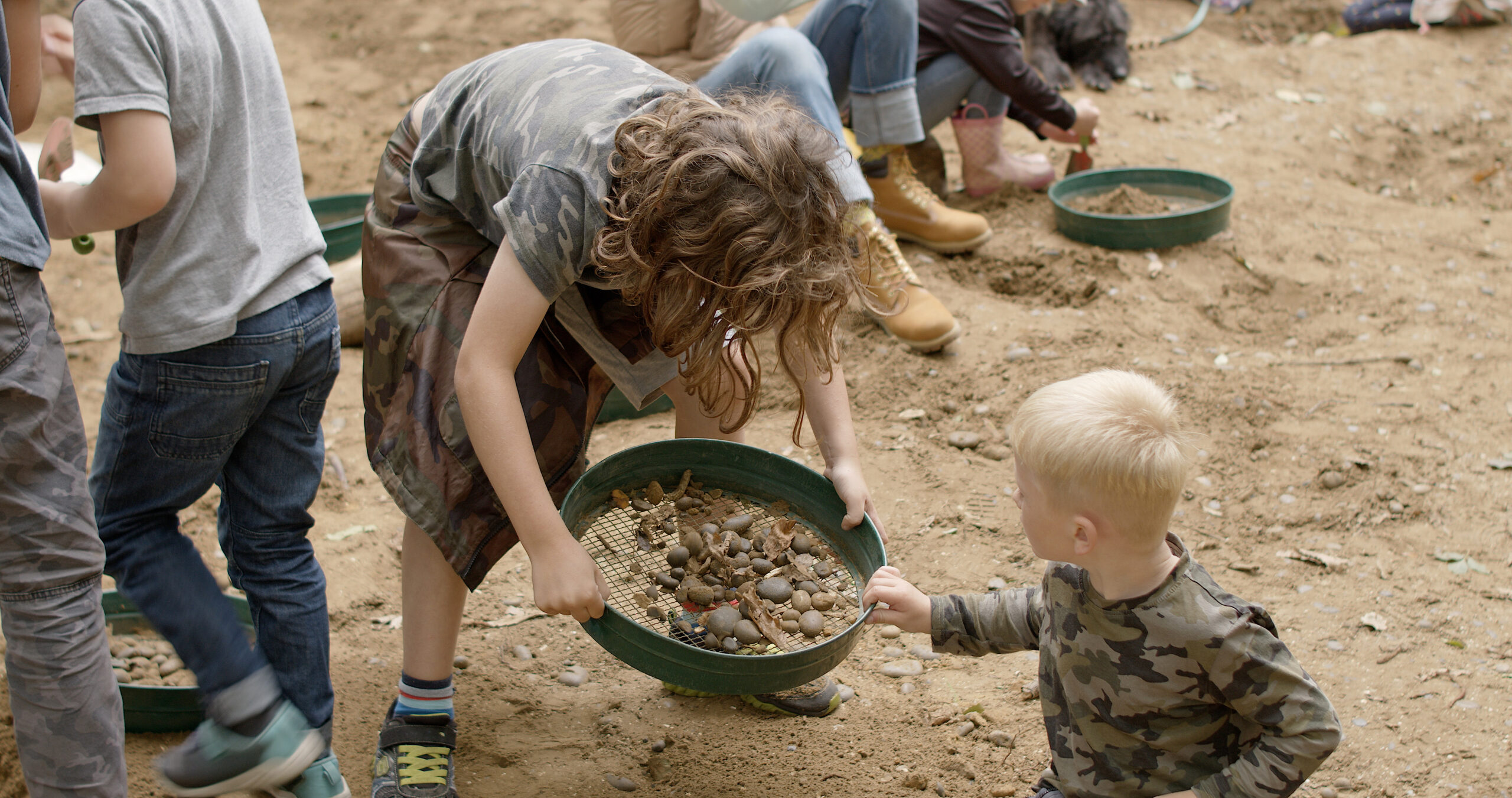 Sieving for fossils in the fossil pit