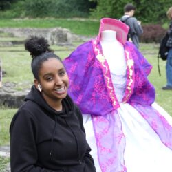 student will large sculptural dress