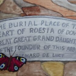red Admiral Butterfly resting on slate marking where Roesia de Dover's heart is buried in Lesnes Abbey Wood