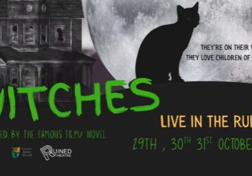 a poster depicting a black cat sitting on a wall