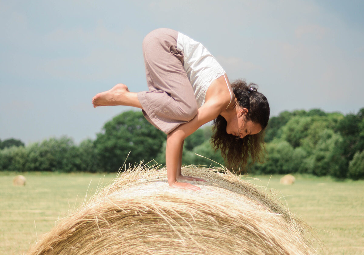 Yoga instructor practices in a field