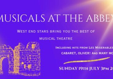 blue poster advertising musicals at the abbey